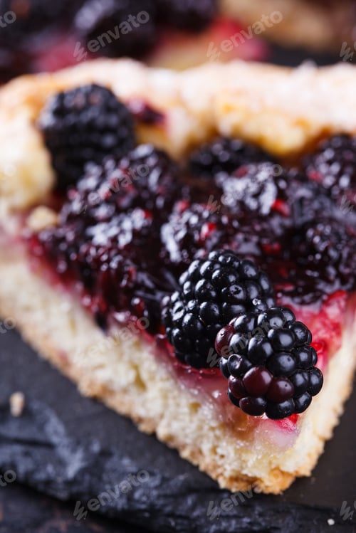 Preview: Sweet pastries with berries. Dessert.Galette with blackberries
