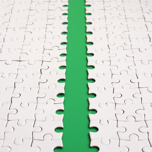 Preview: The green path is laid on the platform of a white folded jigsaw puzzle. Tex