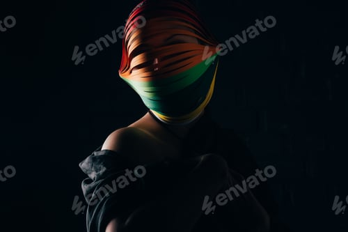 Preview: woman with colored quilling paper on head isolated on black