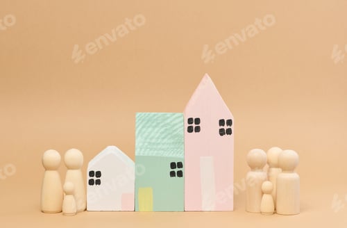 Preview: Wooden houses and wooden men of a family with children. Concept of searching for rental housing