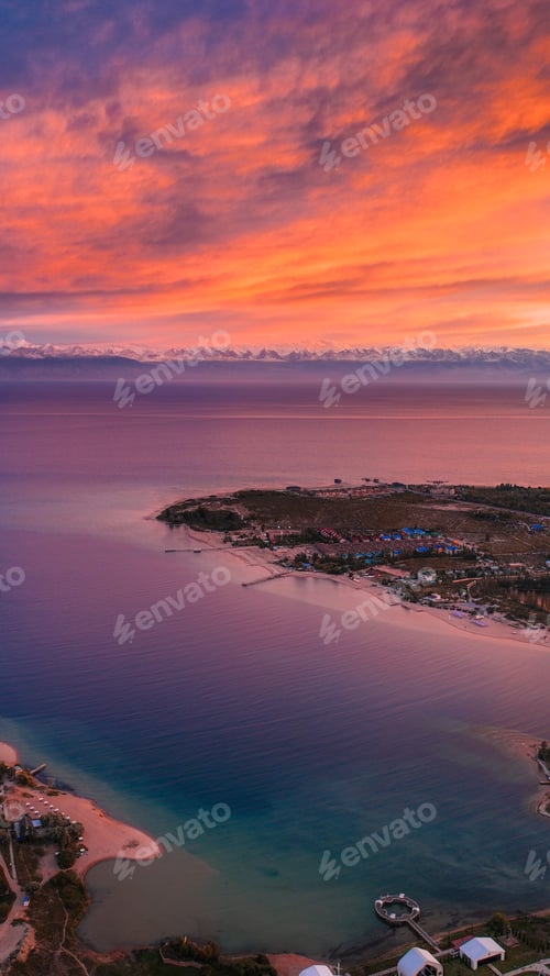 Preview: Fiery Orange Sunset over Issyk Kul Lake and Coastline