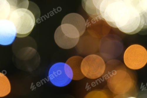 Preview: multicolour defocused glitter lights background. Rounded defocused lights. Abstract bokeh back