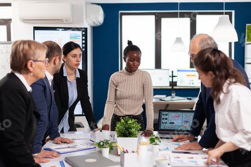 Preview: Diverse colleagues businesspeople discussing company issue