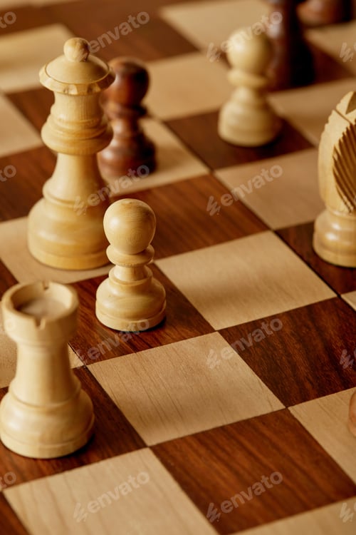 Preview: selective focus of wooden chess pieces on chess board
