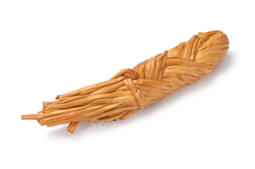 Preview: Smoked cheese braid from the Adyghe Republic on white background