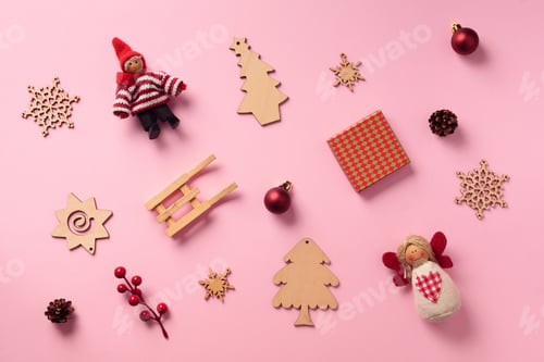 Preview: Greeting card for New year party. Christmas gifts, decorative elements and ornaments on pink