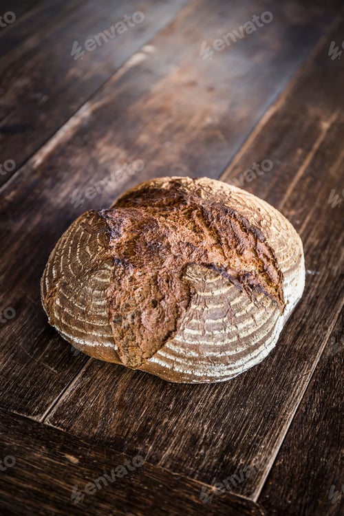 Preview: Sourdough loaf on wooden table