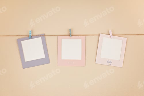 Preview: Mock up with colorful picture frames hanging on the rope with copy space for text and photos