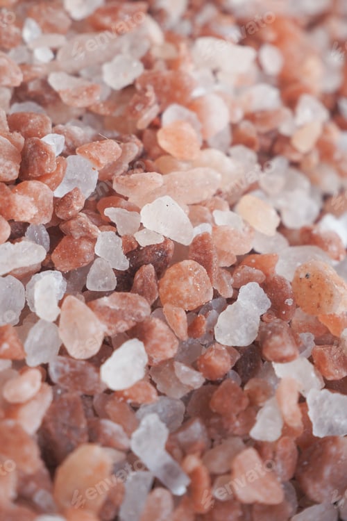 Preview: close up of pink rock salt in a bowl on table