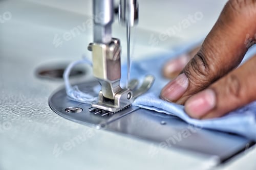 Preview: Tailor Using Sewing Machine