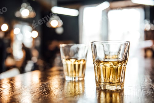 Preview: glasses of whiskey on the table