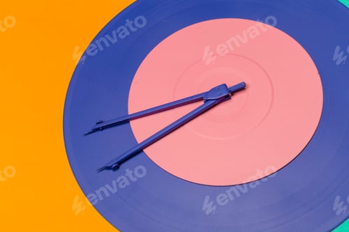 Preview: Creative design using compasses and colorful circular patterns at an art studio