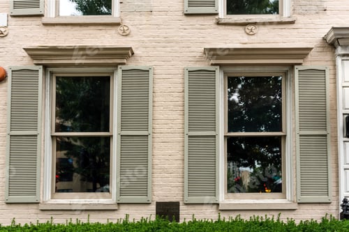 Light Brick Building Facade With Window Detail