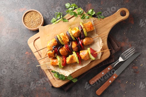 Preview: Concept of tasty food with chicken shashlik on dark textured background