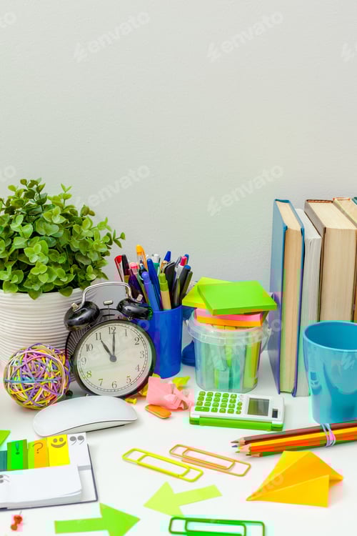 Preview: Work place of a creative person with a variety of colorful stationery objects