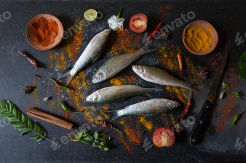 Preview: Fish and spices on a dark background