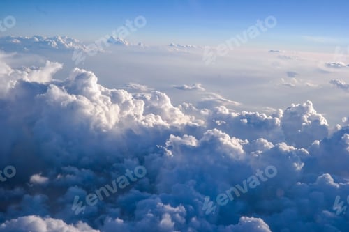 Preview: Aerial shot of fluffy clouds in the sky