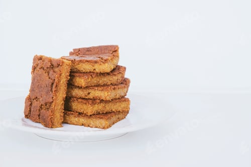Preview: Delicious freshly baked blondie brownie dessert slices.