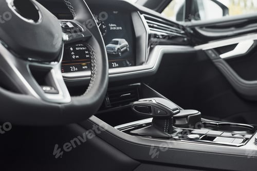 Preview: Interior of a prestigious modern black car. Leather comfortable seats and accessories and steering