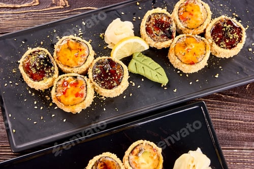 Preview: Sushi rolls with eel and avocado, close up.