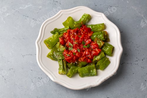 Preview: Fried green peppers with tomato sauce - Turkish name; Domates soslu biber kizartmasi