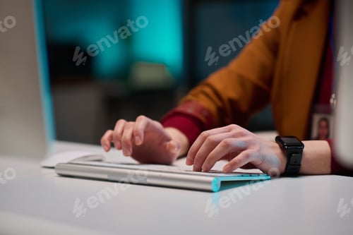 Preview: Female Hands Typing on Keyboard