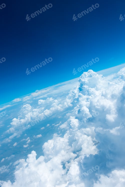 Preview: Aerial view of Blue sky and Cloud Top view from airplane window,Nature background