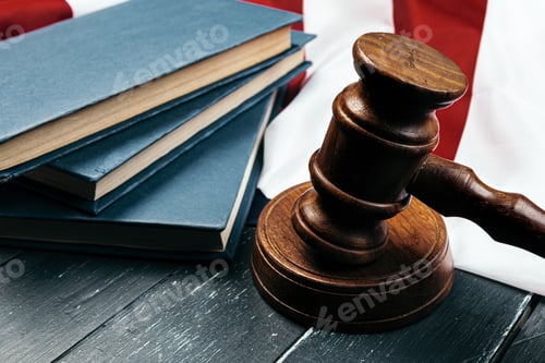 Preview: Judge gavel on the background of the flag united states of America