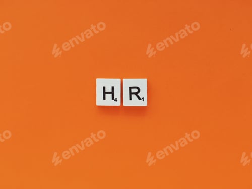 Preview: HR scrabble letters word on a orange background