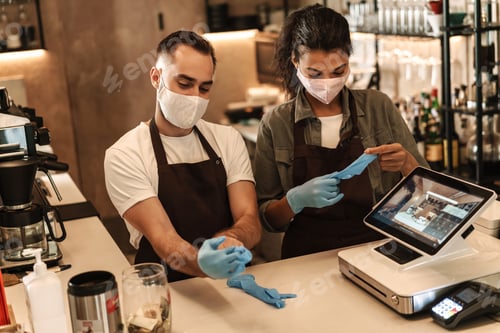 Preview: Coffee shop owners with face masks, lockdown, quarantine, coronavirus, back to normal concept
