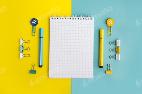 Preview: School supplies. Yellow and blue colors. Empty notebook. Flat lay composition. Space for text.