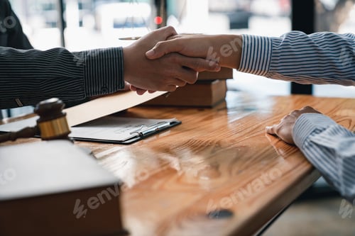 Preview: lawyer or judge shaking hands after agreeing to accept a bribe From businessman to lawsuit to win le