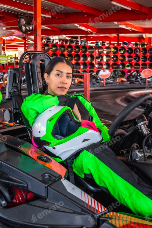 Preview: Young woman enjoying karting experience at race track