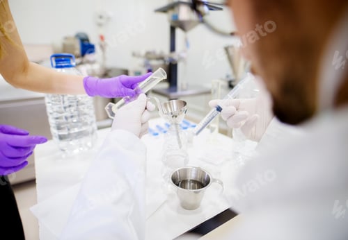 Preview: Young Man In Protective Wear Taking Samples Of Products And Preparing Them For Exam.