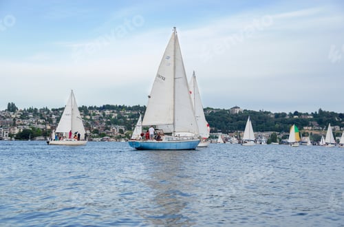 Preview: Sailboats on Lake Union under partly cloudy sky