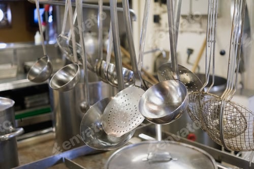 Preview: Steel saucepans and casseroles, in an industrial kitchen.