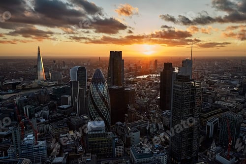 Preview: UK, London, High angle view of City of London skyscrapers at sunset