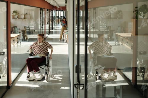 Preview: Young Caucasian Woman in Wheelchair Working in Creative Coworking Space