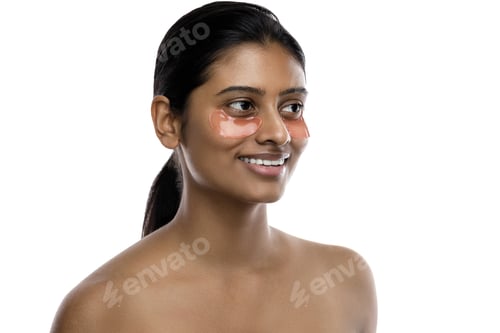 Preview: Beautiful Indian woman with hydrating eye patches under her eyes