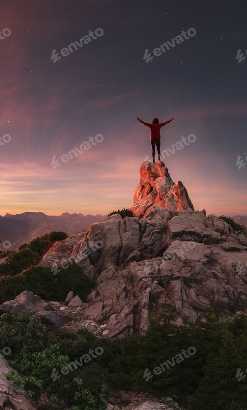 Preview: Adventure Woman Hiker high in mountains. Landscape in Background. Sunset Twilight