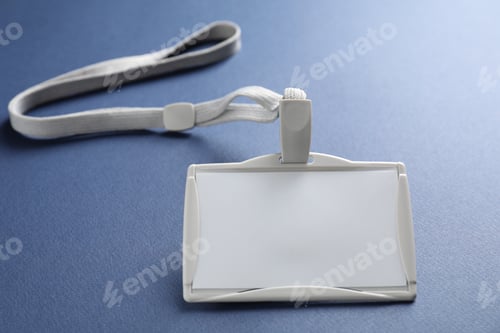 Preview: Blank badge with string on blue background, closeup