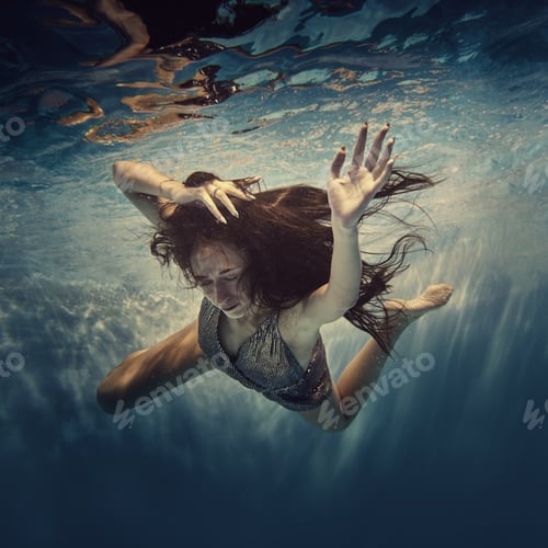 Preview: A Girl In A Brilliant Suit Swims Underwater