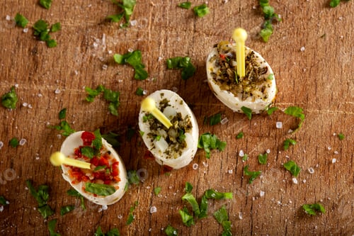 Preview: Small pieces of cheese with vegetables and herbs