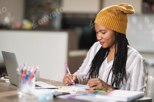 Preview: Black Woman Working At Home