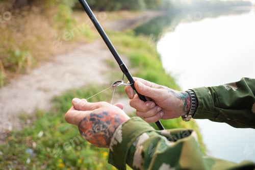 Preview: pensioner collects a fishing rod. Instruction, collection process. Copy space, senior concept
