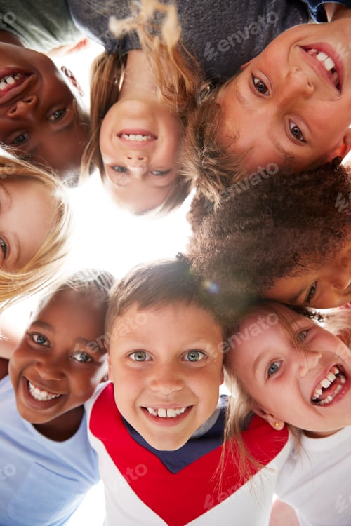 Preview: Group Of Multi-Cultural Children With Friends Looking Down Into Camera