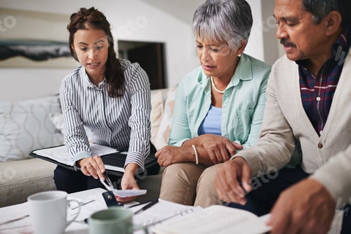 Preview: Financial Advisor Meeting with Senior Couple at Home