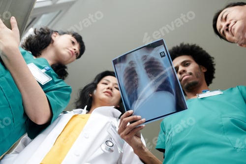 Preview: Medical Workers Looking at X-ray Image