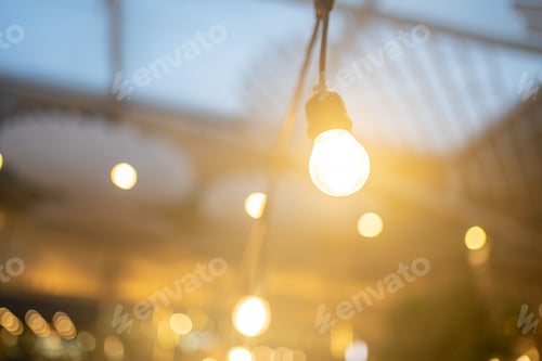 Preview: Orange light bulb decor at night