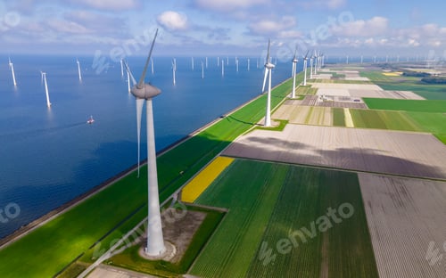 Preview: Windmill turbines at sea a huge winmill park in the Netherlands during winter